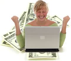 A excited woman in front of her laptop with money in the back ground