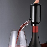 All Things Arts & Entertainment, picture of a wine bottle stopper that also dispenses the win. 